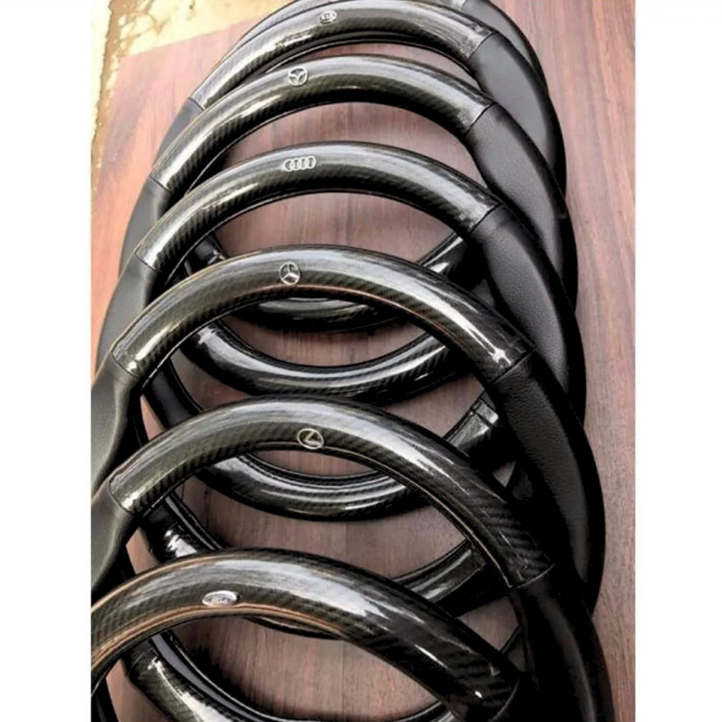 Bọc vô lăng carbon 4s cao cấp kèm logo Hãng