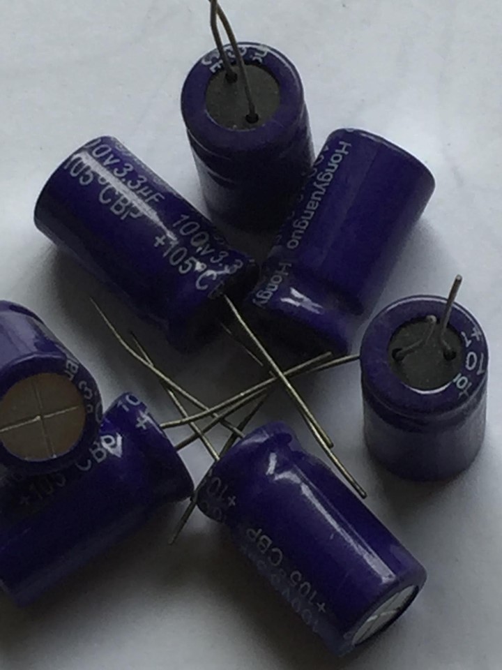 4 Tụ dùng gắn loa trung 3.3uf / 100v