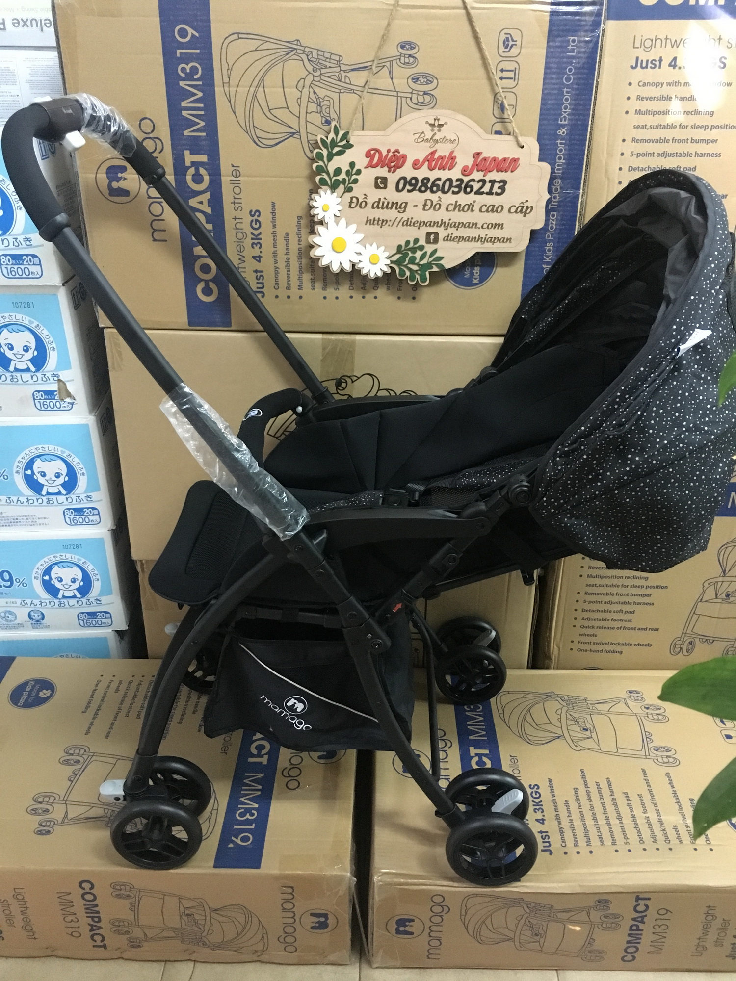 Xe đẩy em bé Kids Plaza Compact 319  (tên cũ Mamago Compact 319) màu đen