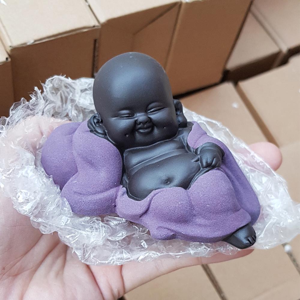Tượng chú tiểu nằm ngủ bằng gốm tử sa