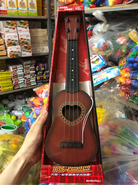 Đàn ghita nhựa giả gỗ