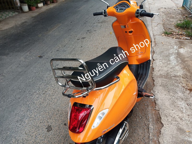cặp gác chân xe vespa