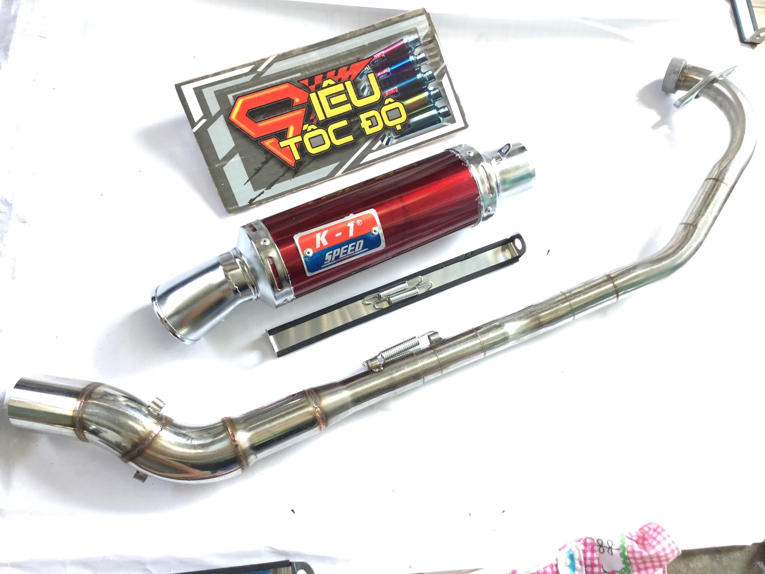 Pô k1 đỏ full pass treo lò xo bao gồm cả cổ pô độ cong 2 khúc cho xe exciter 135.........