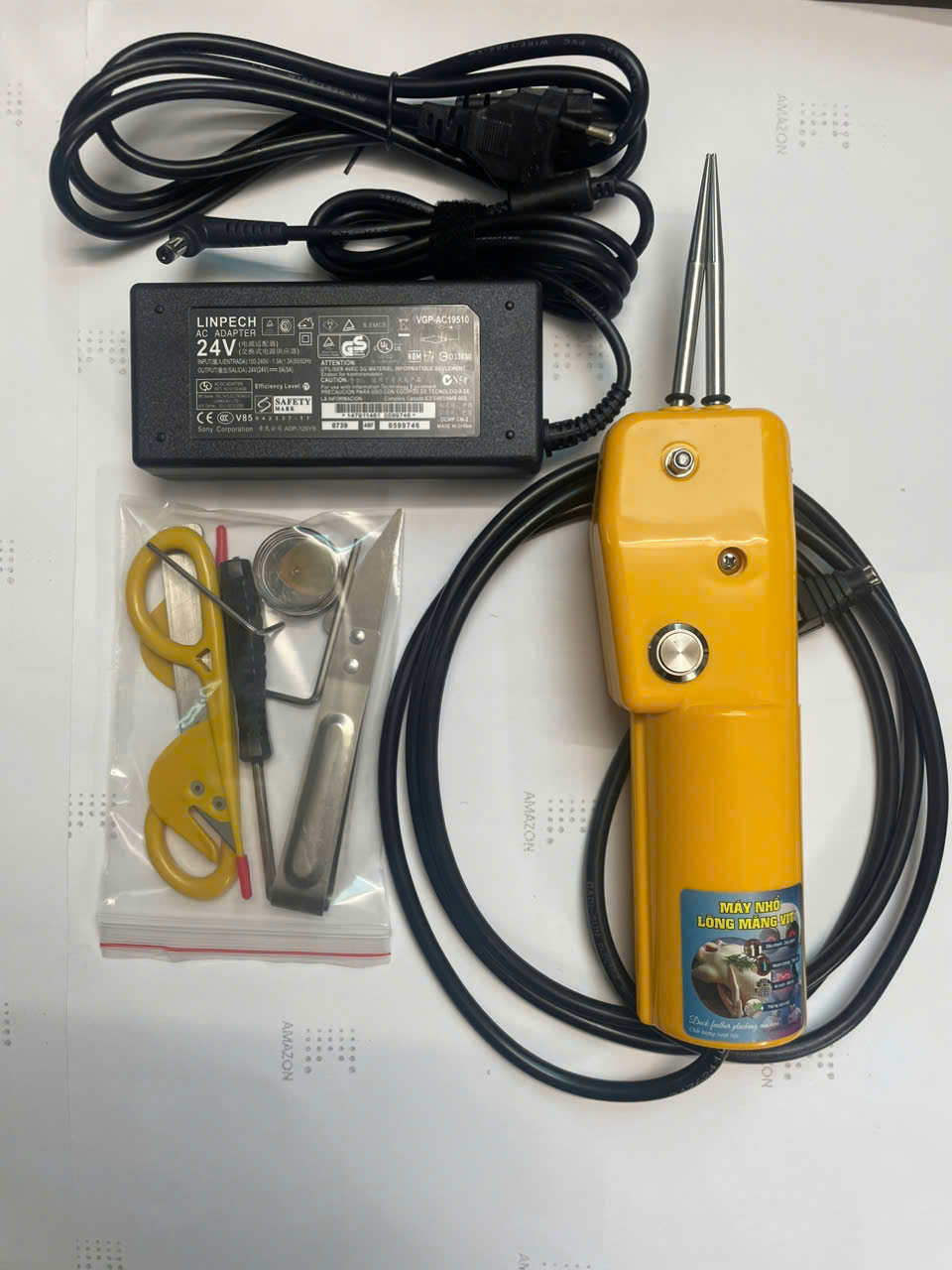 Máy nhổ lông măng vịt cầm tay