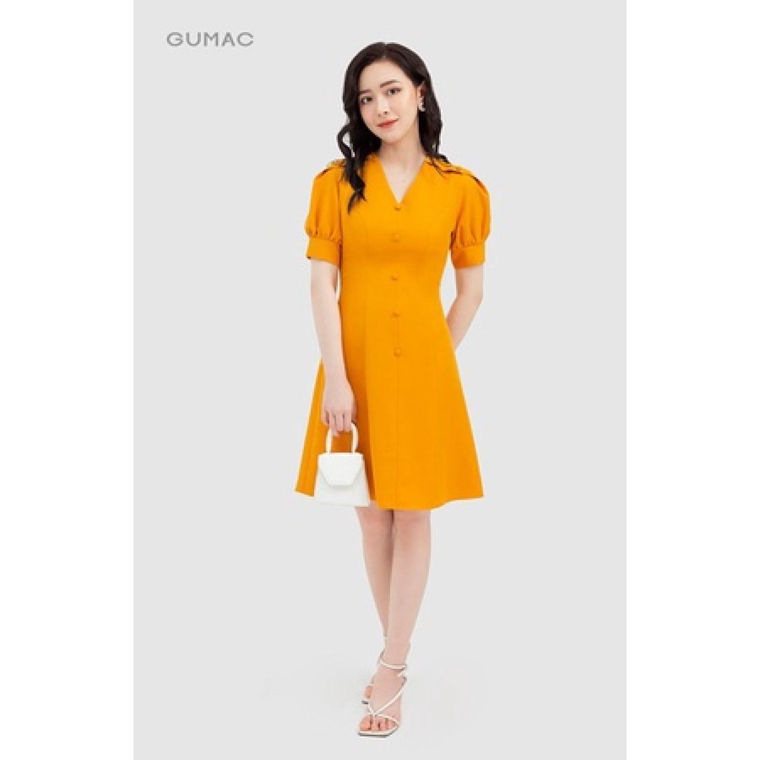 Đầm cổ V phối nút GUMAC