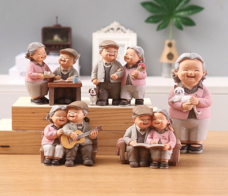 Tượng ông bà đánh đàn ghi ta