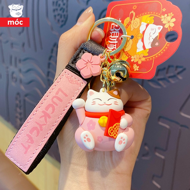 Móc khóa Mèo thần tài ôm vàng bạc
