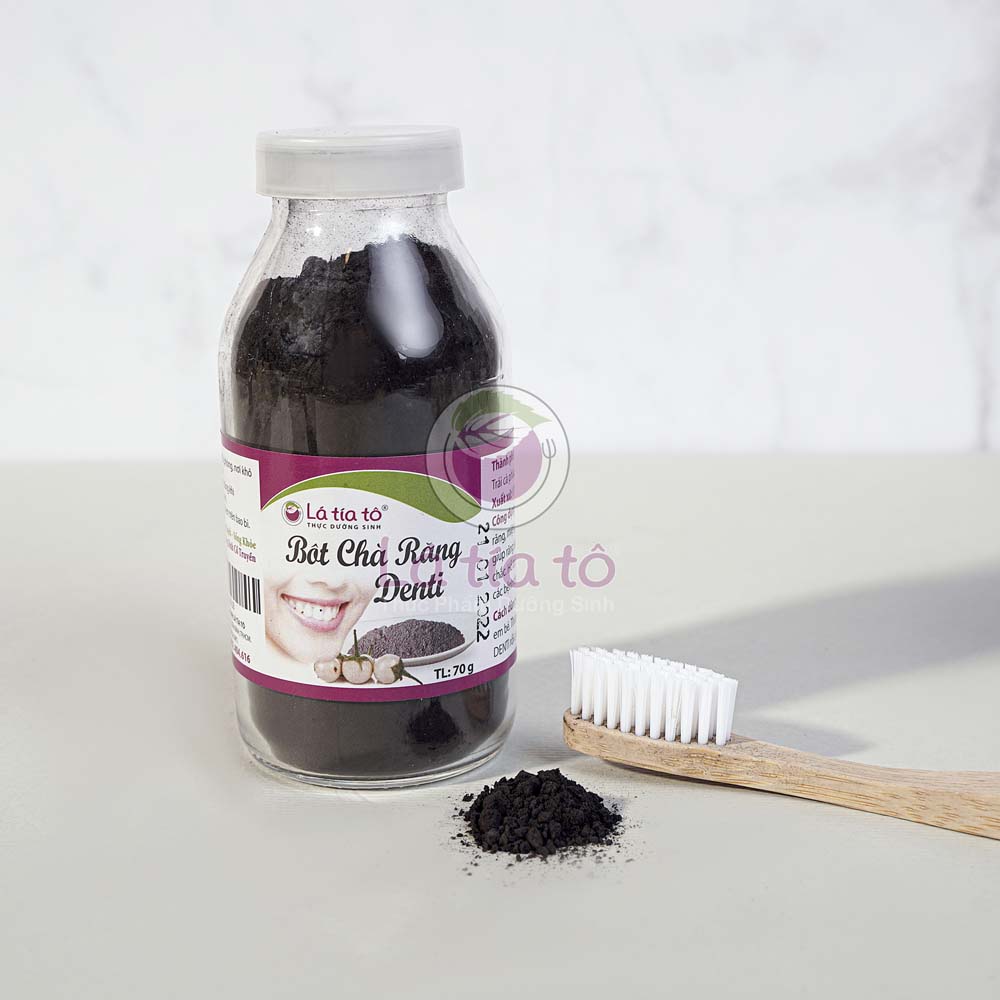 BỘT CHÀ RĂNG DENTI 70gr - LÁ TÍA TÔ