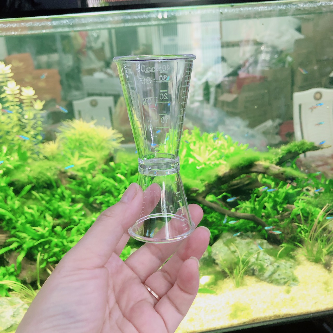 Ly đong định lượng nhựa 2 đầu