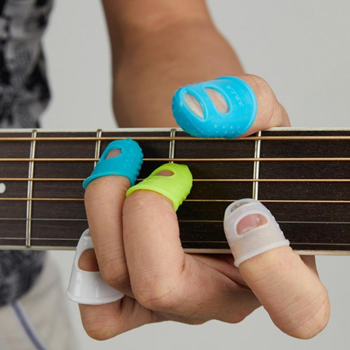 Đàn Guitar đầu ngón tay bảo vệ 10 cái Silicone ngón tay bảo vệ 5 kích cỡ