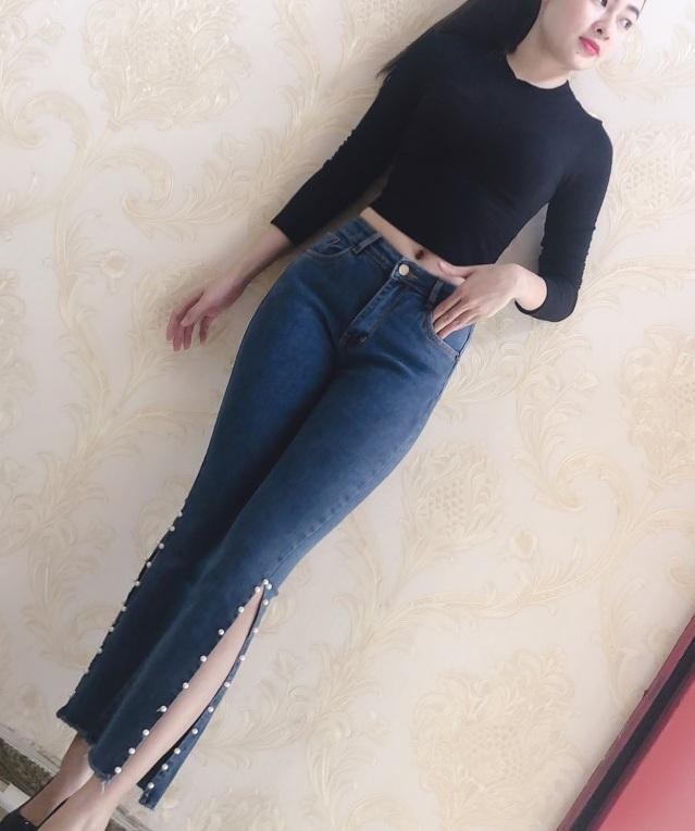 Quần jeans nữ ống loe dài xẻ gấu