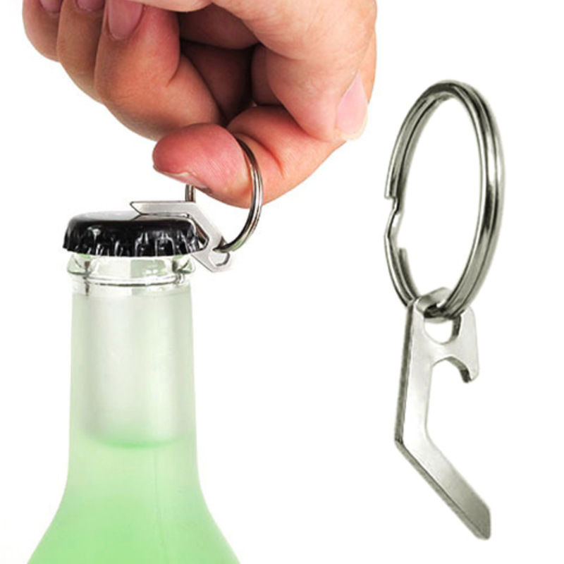 1 CÁI. MÓC KHÓA NHỎ CÓ CHỨC NĂNG KHUI NẮP CHAI TIỆN ÍCH. TH329.906