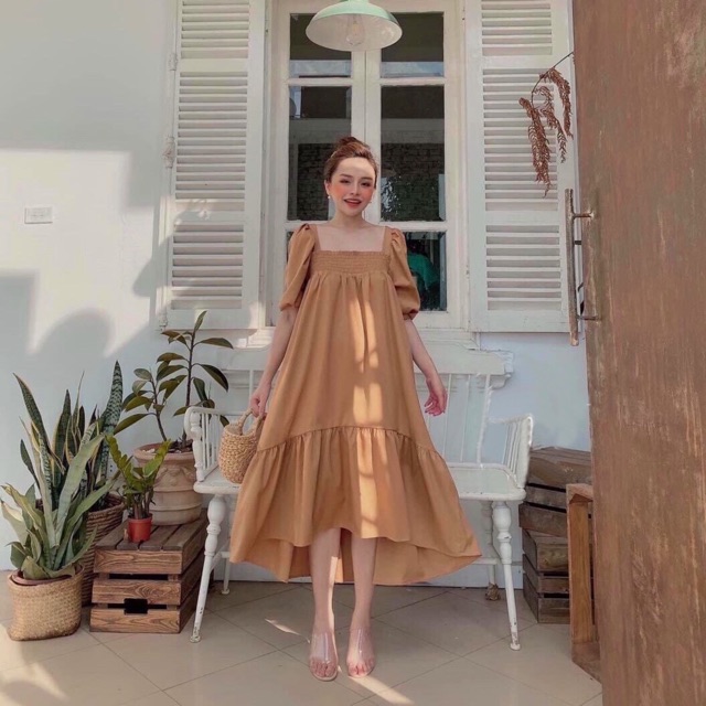 Đầm kem đuôi cá nhúng thun ngực