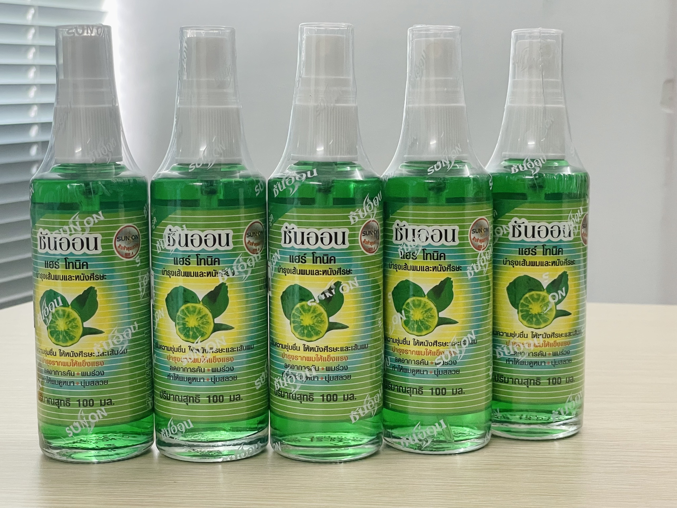 Tinh dầu bưởi kích mọc tóc Sun On - Thái Lan