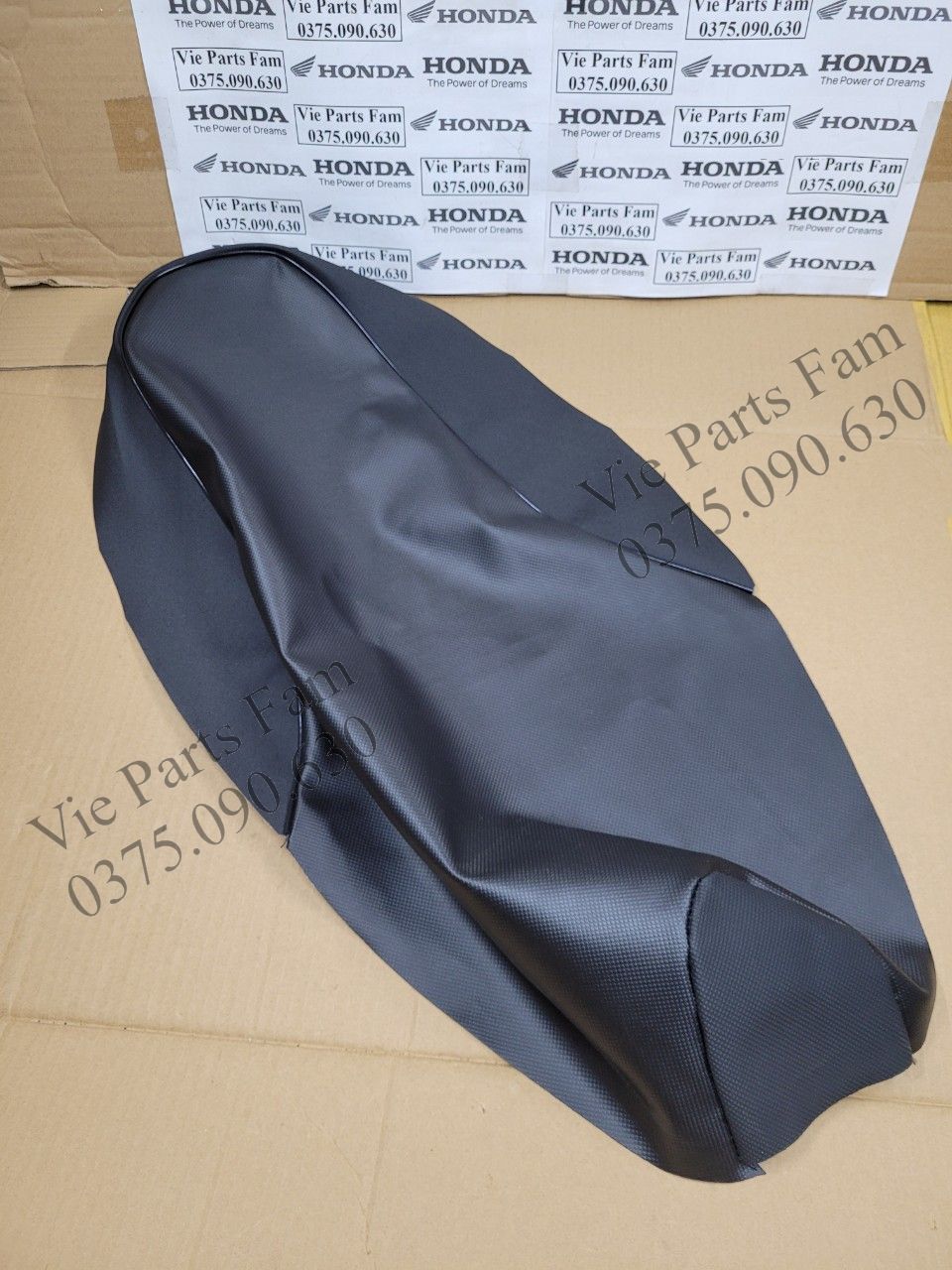 Da bọc yên (vỏ yên) Wave S110 (hàng tốt)
