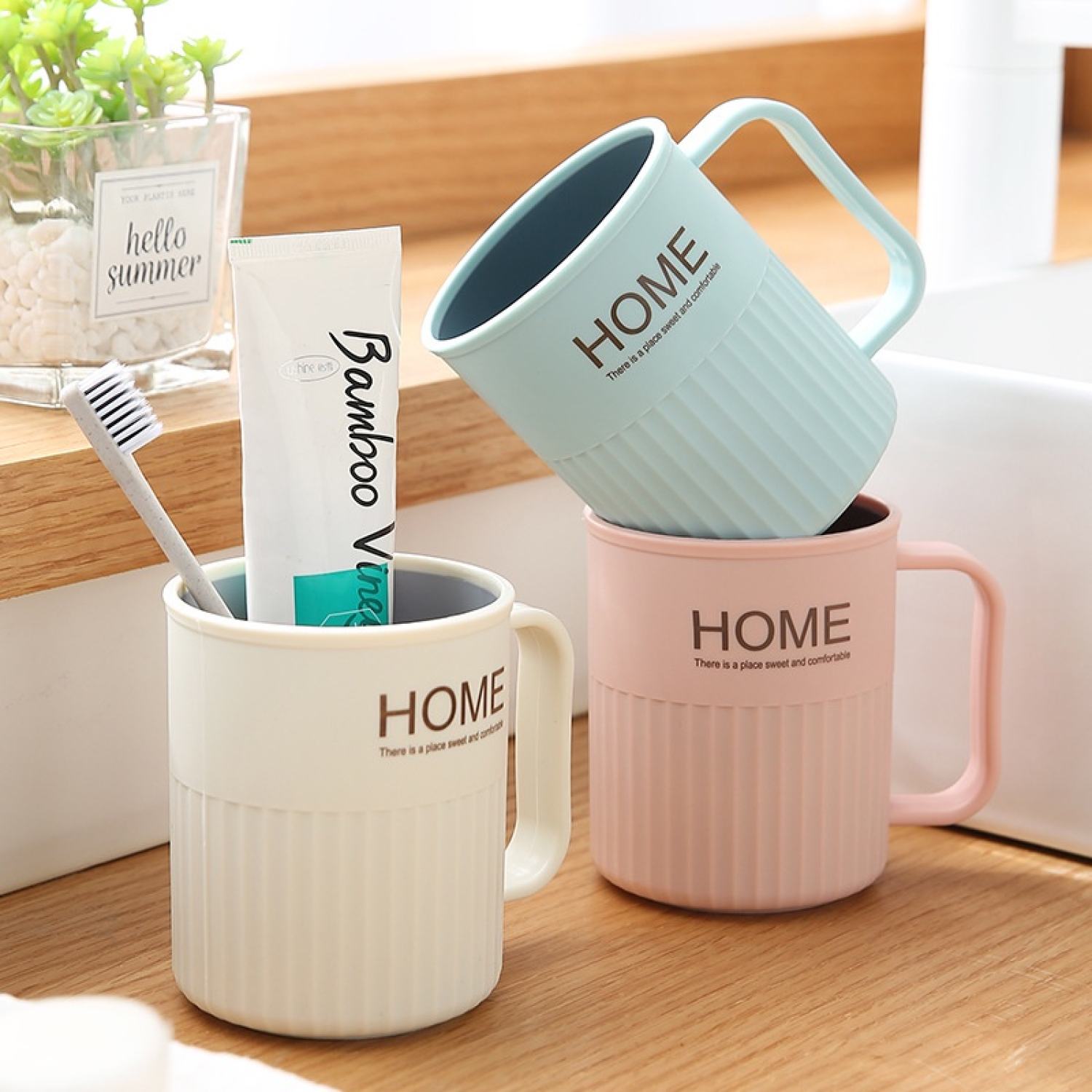 Cốc ly uống nước, đánh răng chữ Home có quai cầm