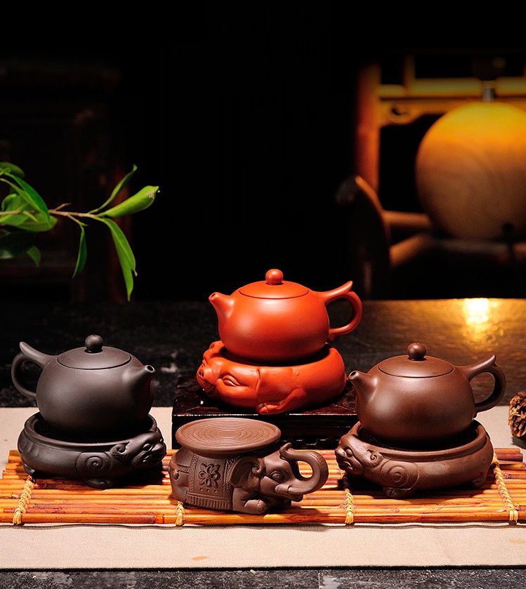 Đôn voi mini cõng ấm trà , chén, chậu bonsai
