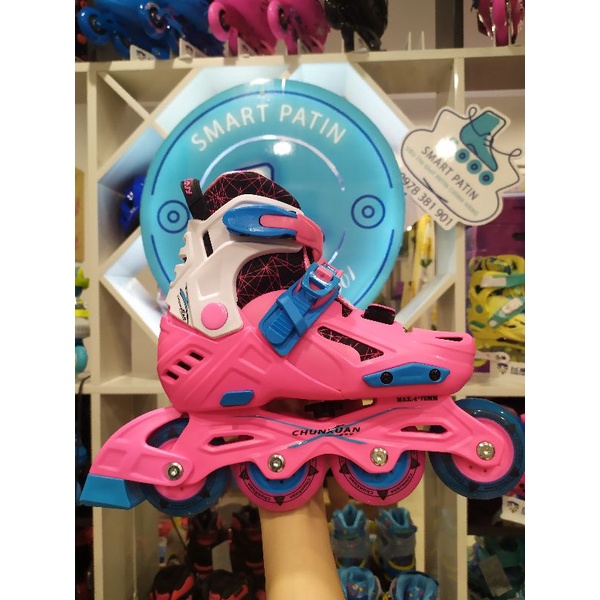 Giày patin  CX Skating shoes nhựa đúc cao cấp, có thiết kế khóa bánh tự động