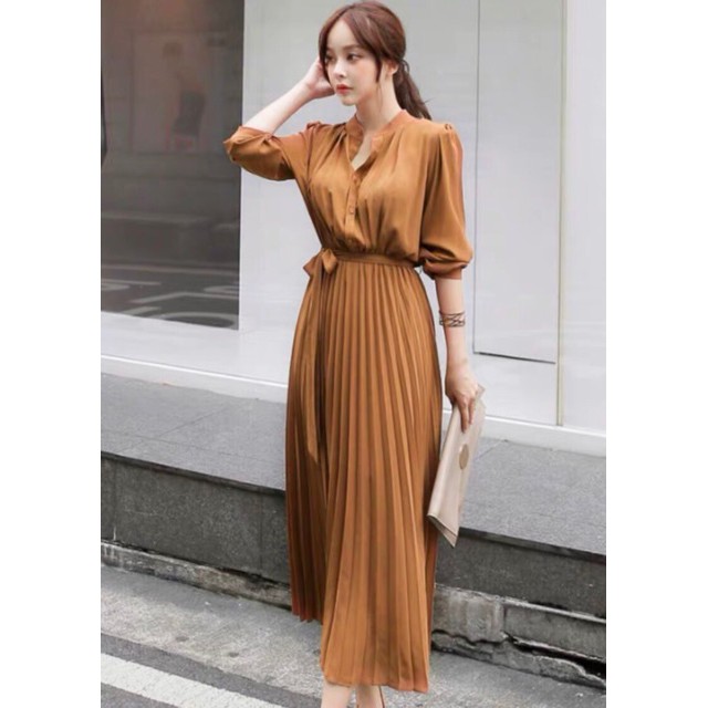 Đầm vàng đồng cổ trụ tùng dập li