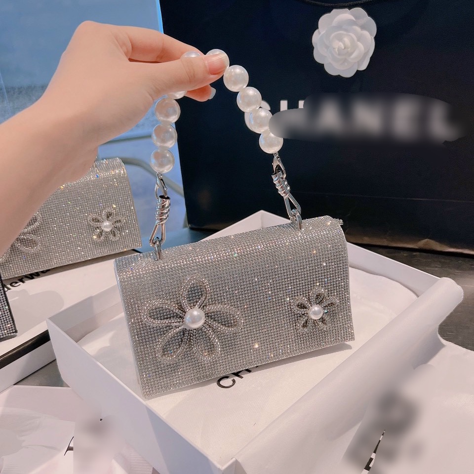 Clutch nữ nạm đá đính bông thời trang