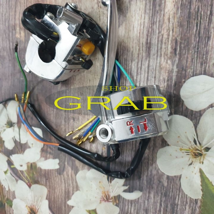 Bộ cùm công tắc xe CUB 82 (2 bên) - không đề