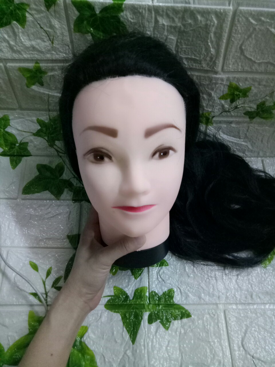 Đầu manocanh tập cắt tóc