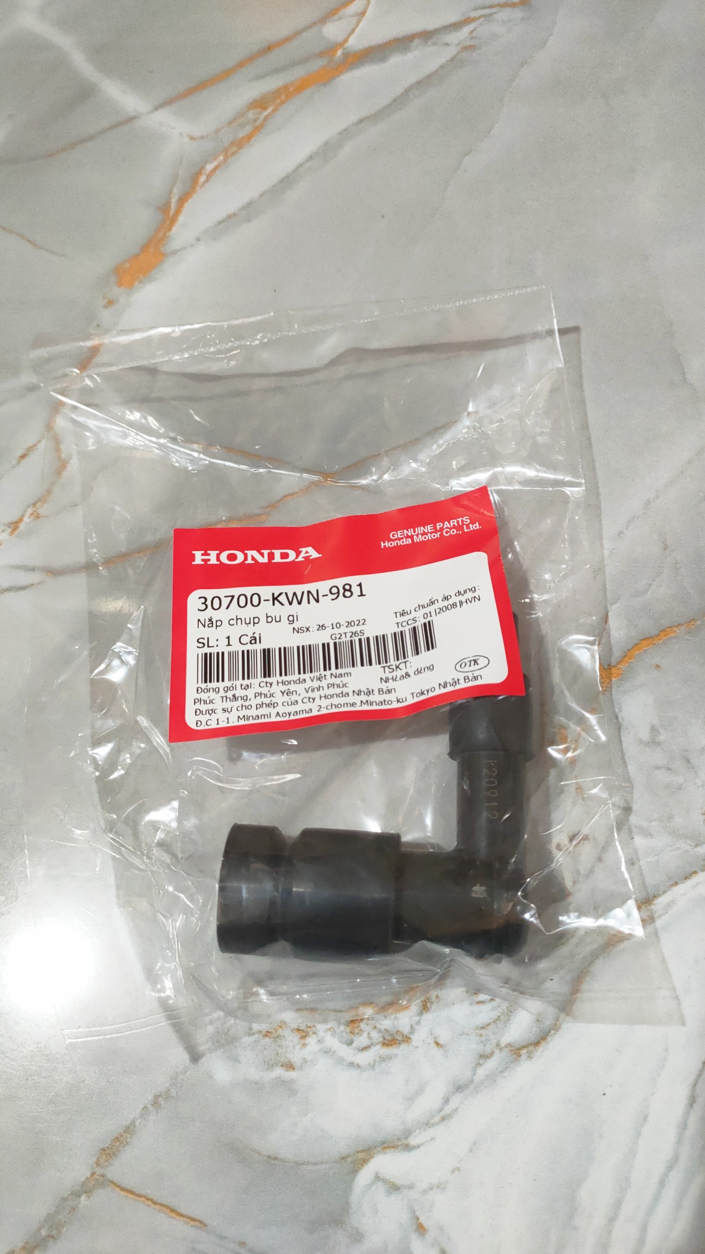 Nắp chụp bu gi PCX (30700KWN981)