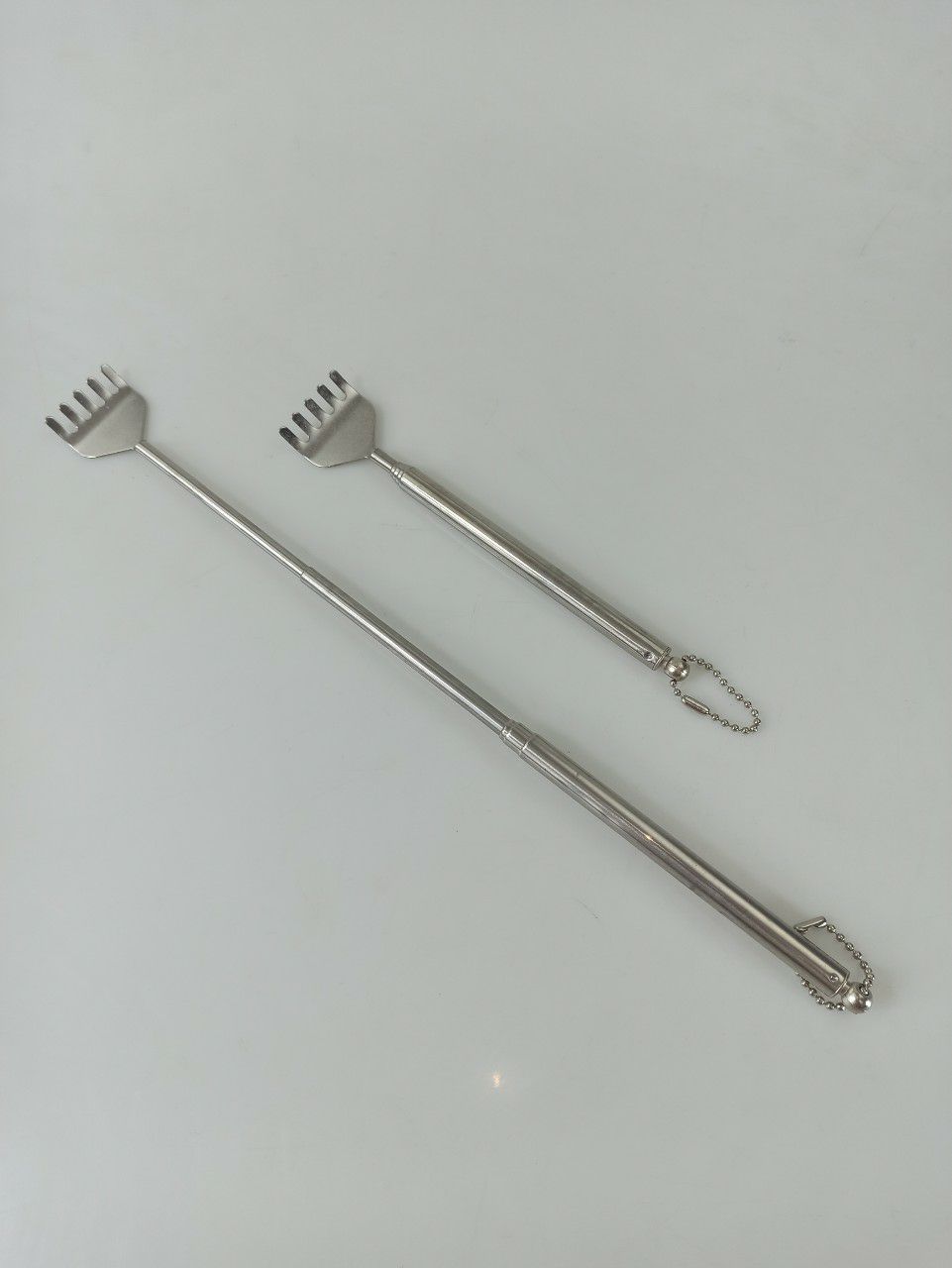 Cây gãi lưng inox đầu inoc
