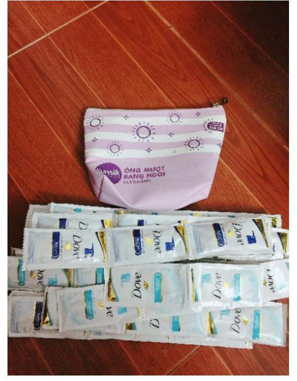 Set 50 gói sữa tắm Dove + ( tặng 1 túi tiện ích tùy mẫu )