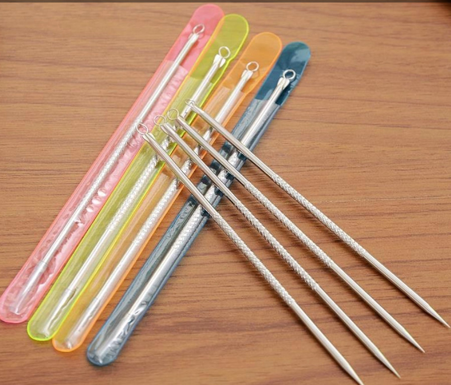 Que Nặn Mụn Trứng Cá