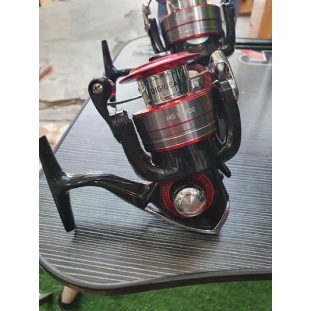 máy câu DAIWA MG S 4000 máy cực khoẻ .  (cam kết đổi trả trong 2 tuần đầu)
