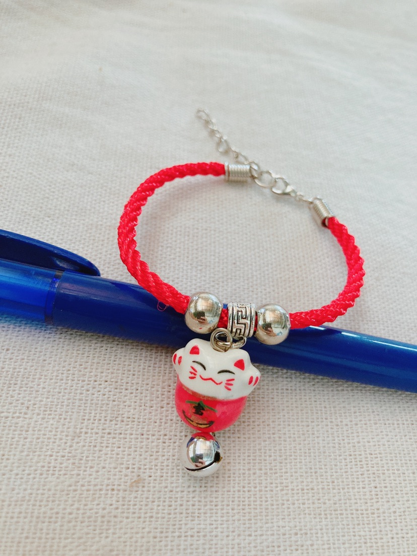 Vòng tay mèo maneki neko gốm sứ