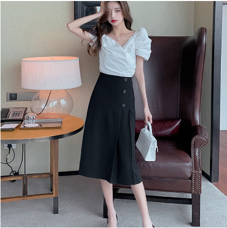 Chân váy xếp ly dài lệch tà