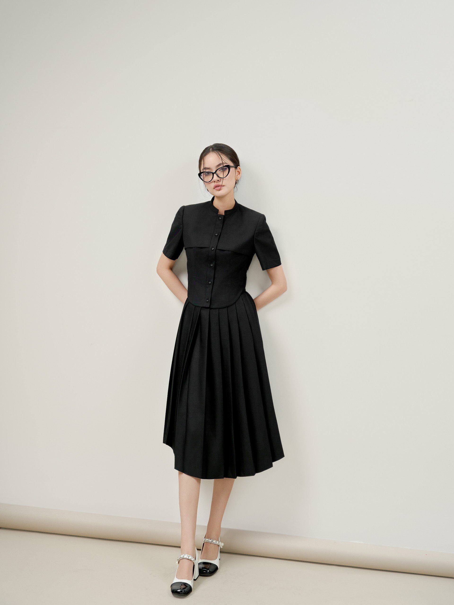 D.CHIC Chân váy xếp ly gấu chéo cạp rời MS: 382875