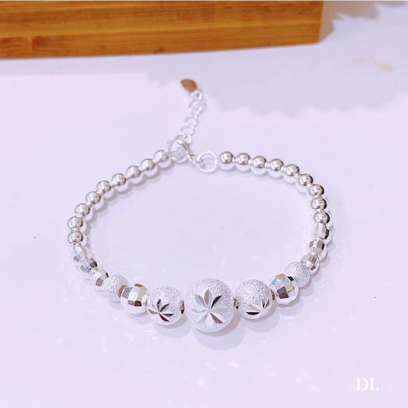 Lắc tay cho bé, lắc bi cầu phay hoa thị chuẩn bạc ta - Kho sỉ bạc Nhất Linh