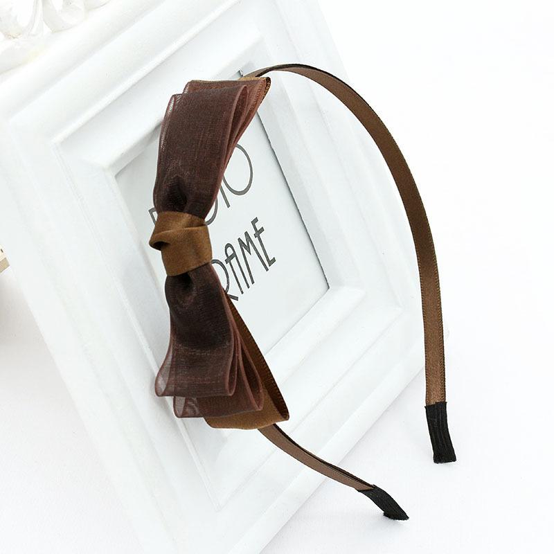 Cài tóc có nơ phong cách nhẹ nhàng, dễ thương