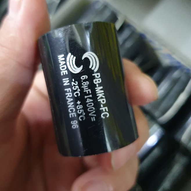 tụ phân tân 6,8uf_400v gia ban 2 con