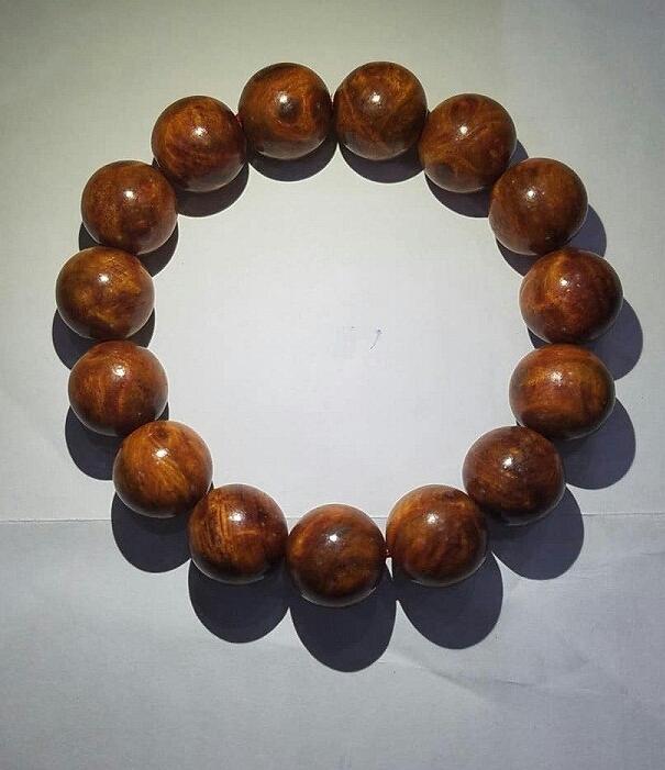VÒNG TAY GỖ NU HUYẾT LONG 14LY
