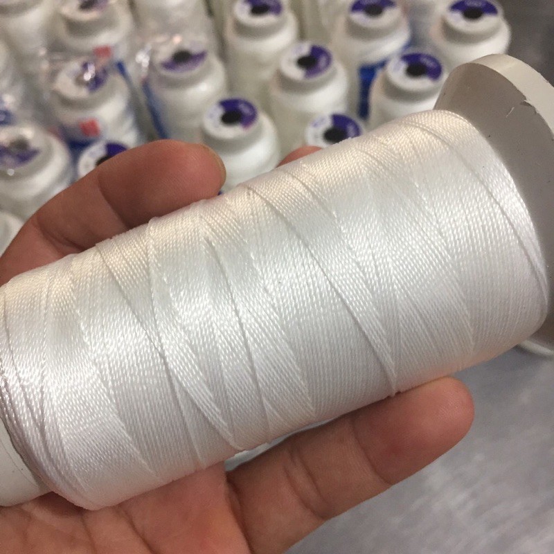 Chỉ xâu vòng chuỗi 1 cuộn màu trắng - ngọc trai trường thịnh