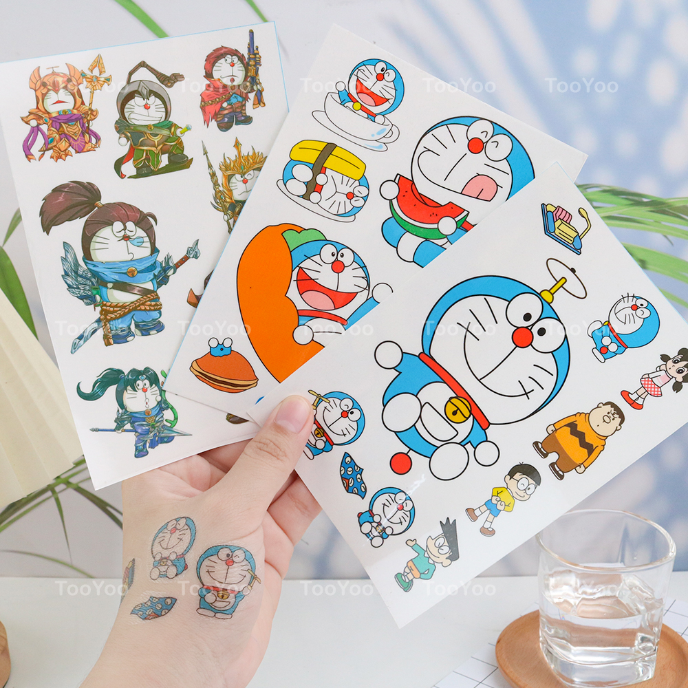 Bạn đam mê Doraemon và muốn thể hiện tình yêu của mình với chú mèo máy huyền thoại nhưng lại sợ đau khi xăm hình? Hình xăm Doraemon dễ thương sẽ giúp bạn đạt được mong muốn đó một cách an toàn và dễ chịu. Với các họa tiết tinh xảo và màu sắc sinh động, hình xăm Doraemon sẽ khiến bạn tự tin và xinh đẹp hơn. Hãy tham gia vào cộng đồng yêu thích Doraemon và trao đổi với những người bạn có cùng sở thích nhé! (Are you a big fan of Doraemon and want to show your love for this legendary cat robot but afraid of the pain of tattooing? The cute Doraemon tattoo design will help you achieve your desire in a safe and comfortable way. With exquisite patterns and vivid colors, the Doraemon tattoo will make you more confident and beautiful. Join the Doraemon fan community and exchange with like-minded friends!)