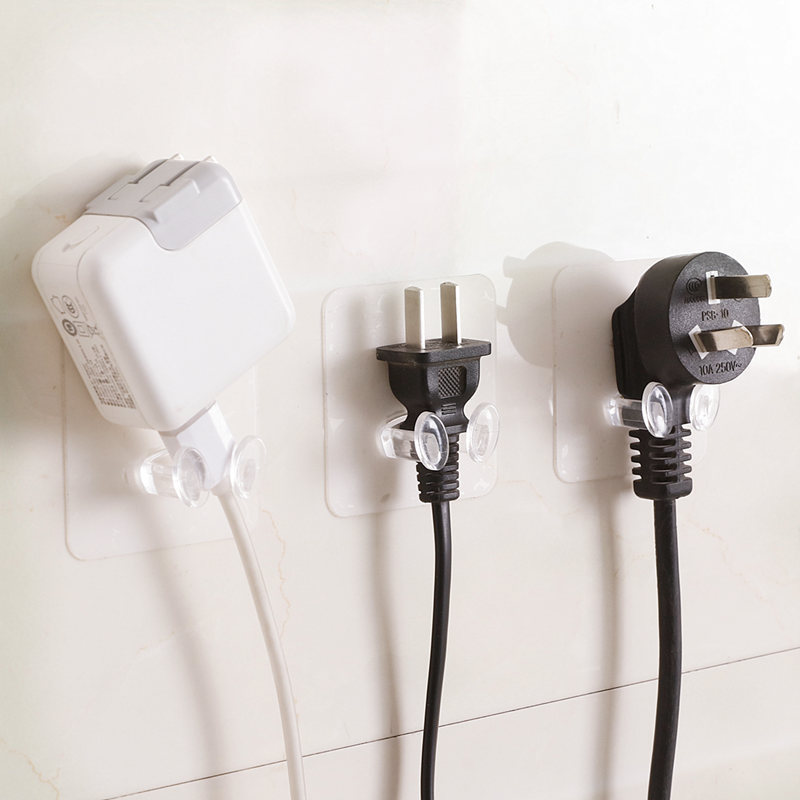 Móc treo dây cắm điện dán tường móc treo phích cắm điện trong suốt a1031