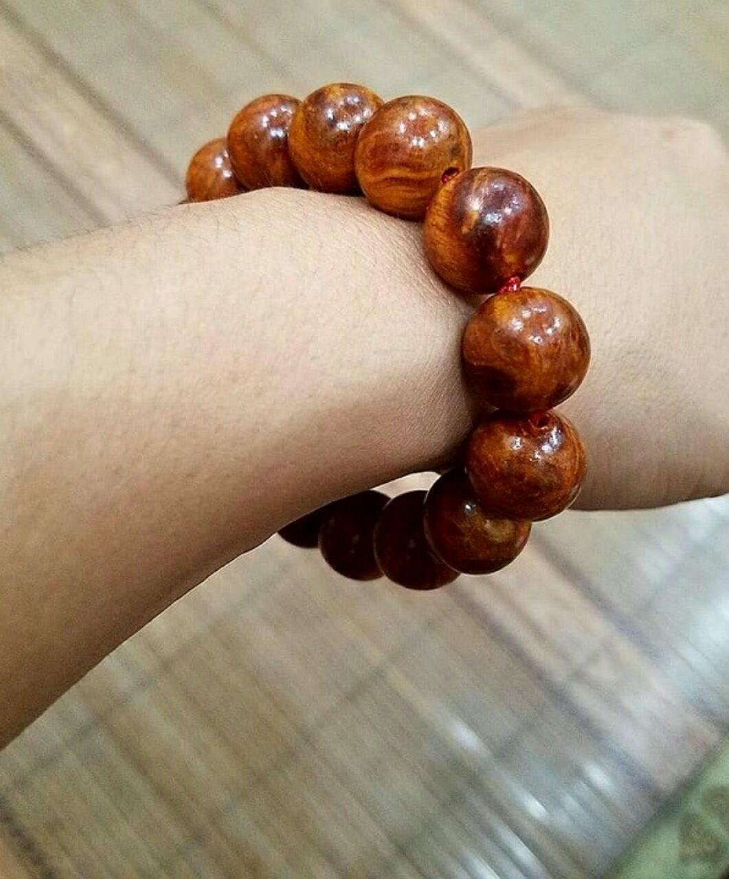 VÒNG TAY GỖ NU HUYẾT LONG 14LY