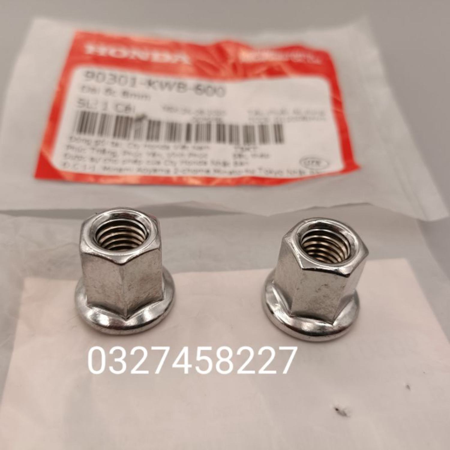 1 ốc bắt cổ pô xe wave a, s110 ,rsx 110... zin . đai ốc 8mm