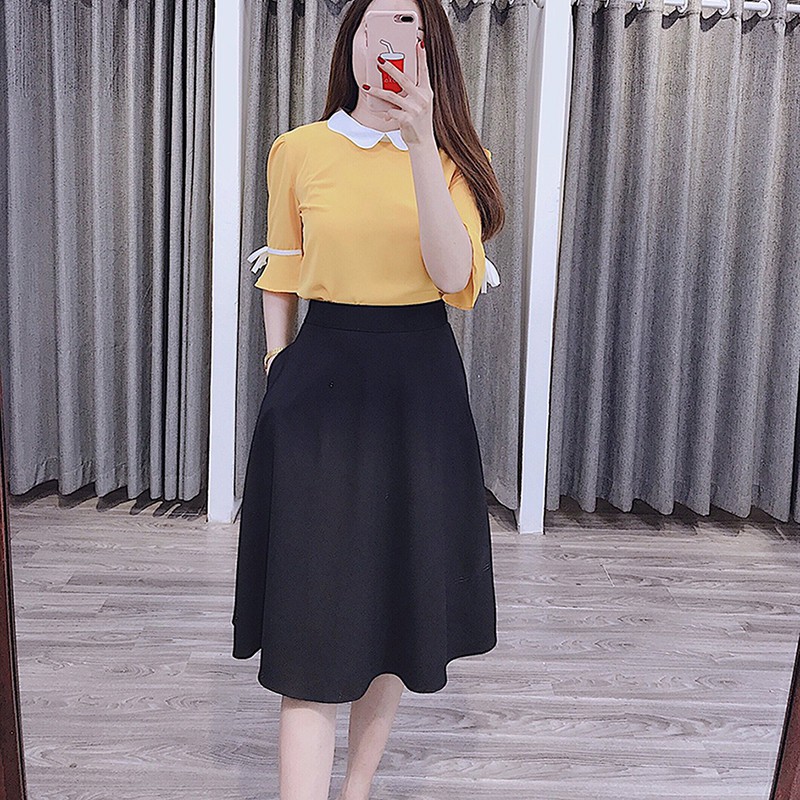 Chân váy xòe dài đến đầu gối thanh lịch