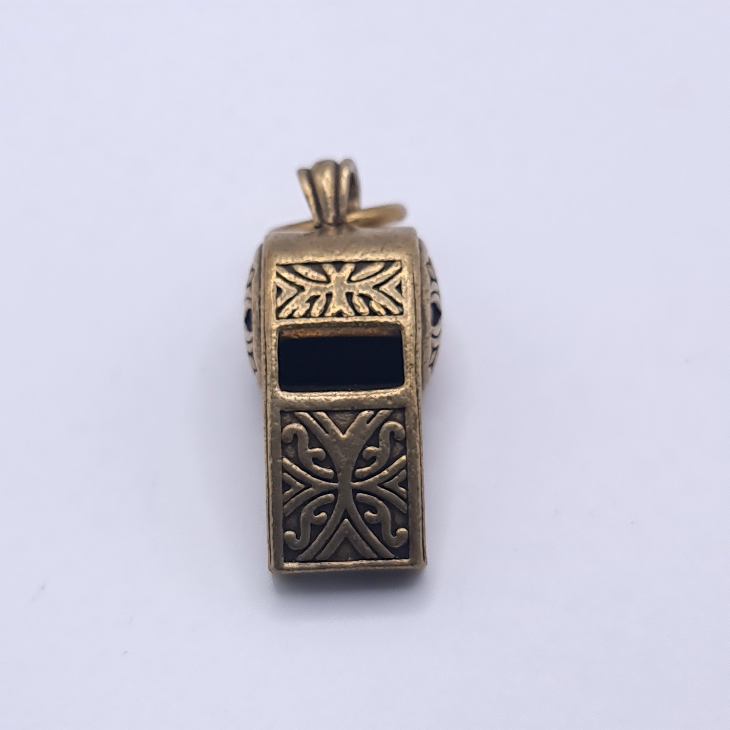 Còi đồng hoa văn kiêm móc khóa