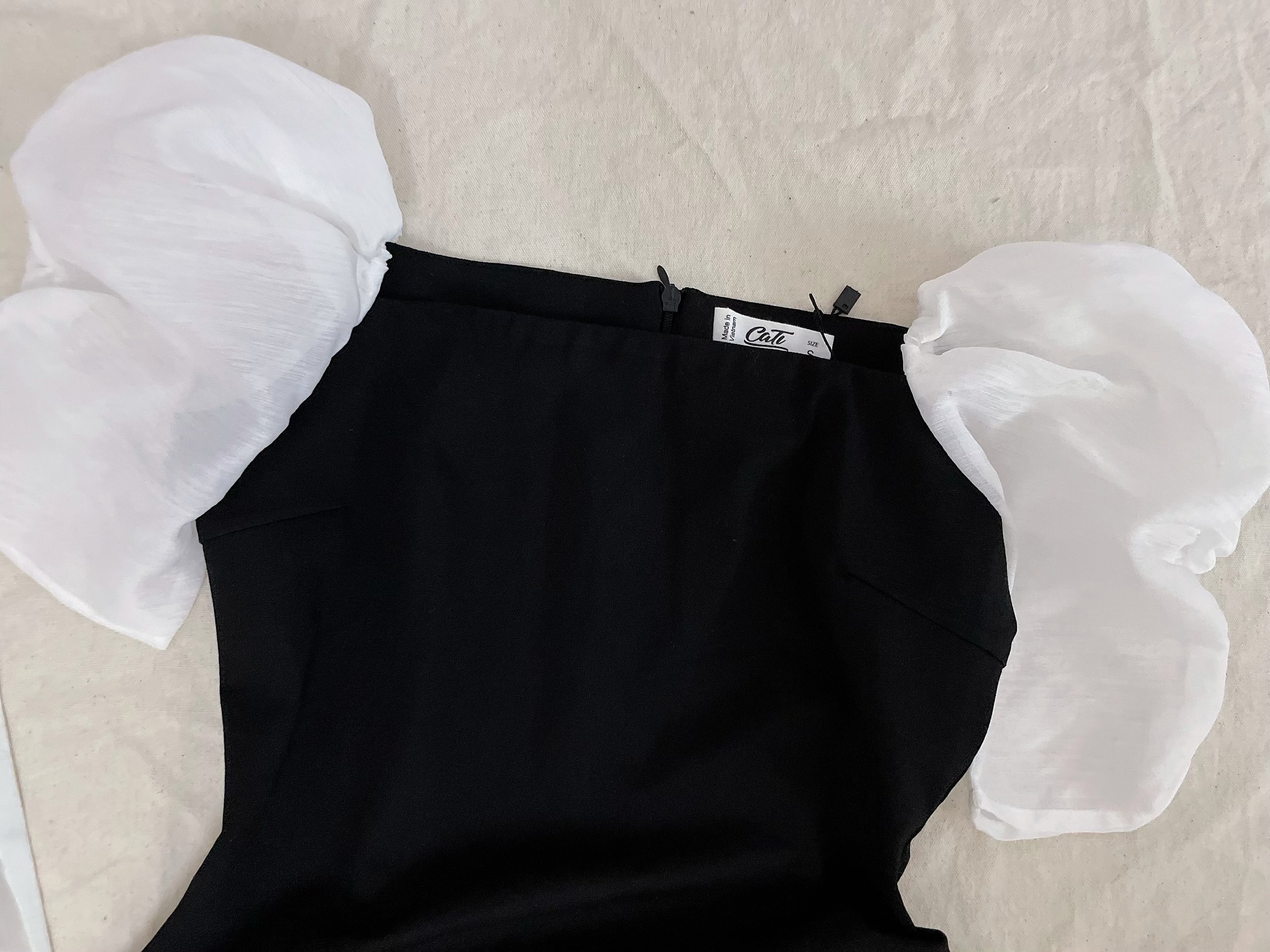 Đầm body phối tay tơ dư tiệc