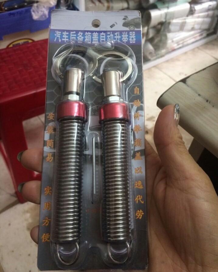 Lò xo mở cốp xe ô tô tự động  bộ 2 chiếc