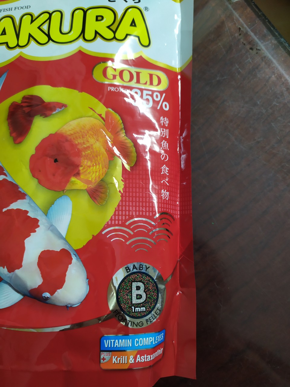 Thức Ăn Cá Sakura Gold Baby 500g ( Hạt 1mm) .