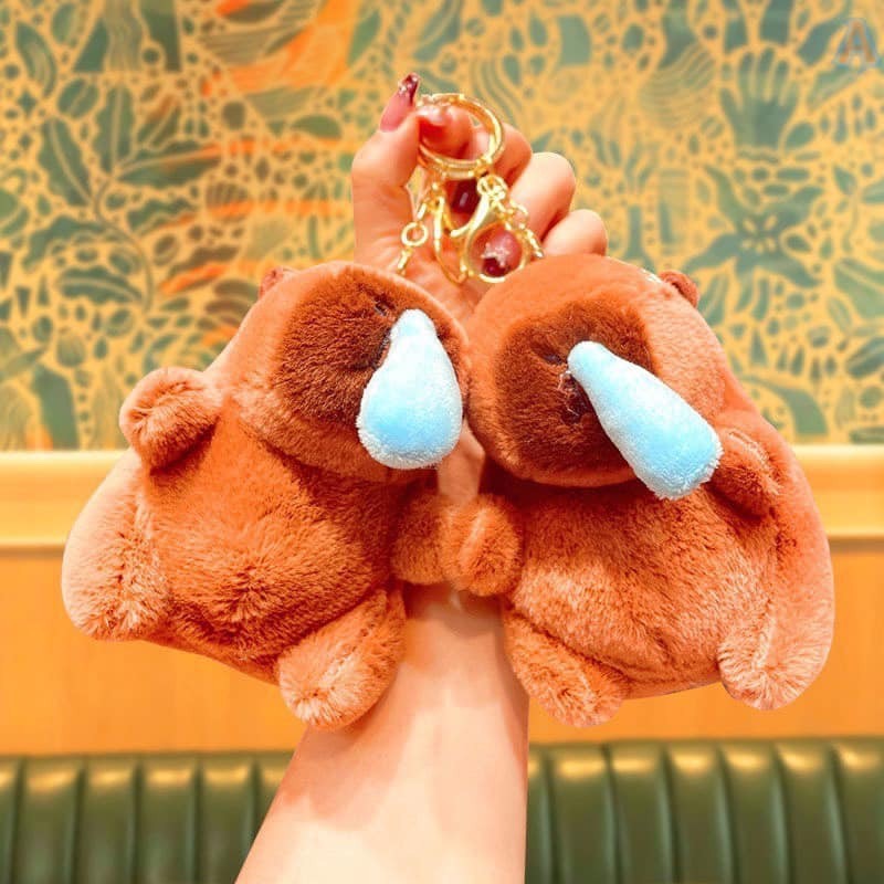 Móc khóa capybara chảy mũi rút mũi hot trend