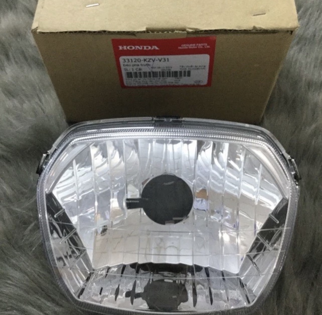 Pha đèn Super Dream 110 Honda (33120KZVV31)